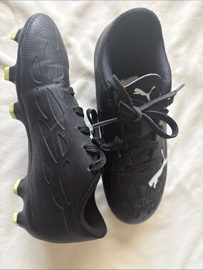 Puma Black Soccer Cleats with Neon Yellow Stud Accents